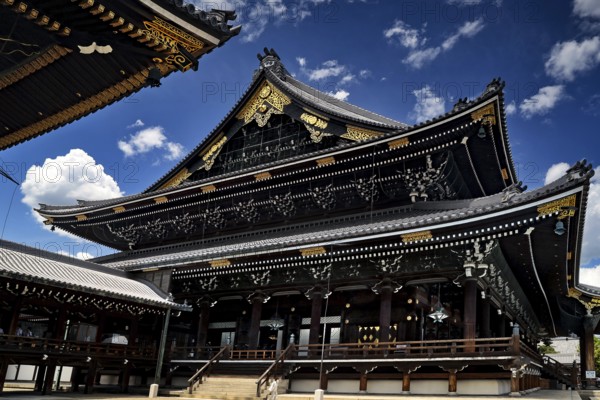 Majestic Higashi Honganji temple under a clear blue sky in Kyoto, Kyoto, Kansai, Japan