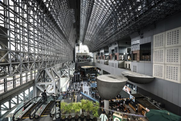 Modern interior view of the impressive ceiling structure of Kyoto Central Station, Kyoto, Kansai, Japan