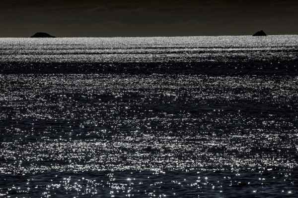 Shimmering water at night in the Bay of Islands, New Zealand, zero