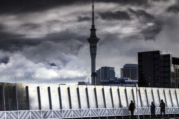 View of Karangalape Road with Sky Tower and dramatic sky, Auckland, null, New Zealand
