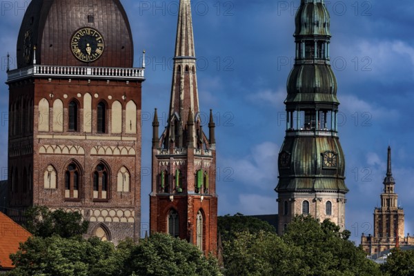 Cathedral towers, Anglican Church and St. Peter's Church in Riga against a blue sky, Riga, Vidzeme, Latvia