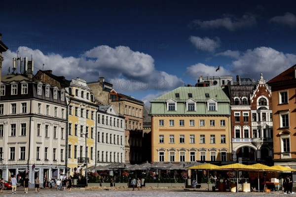Painted buildings on Cathedral Square in Riga under blue sky, Riga, Latvia