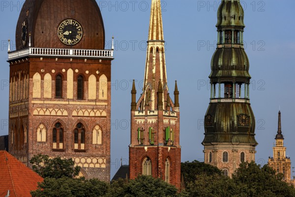 Towers of Riga churches and cathedral rise majestically on the Düna River, Riga, Latvia