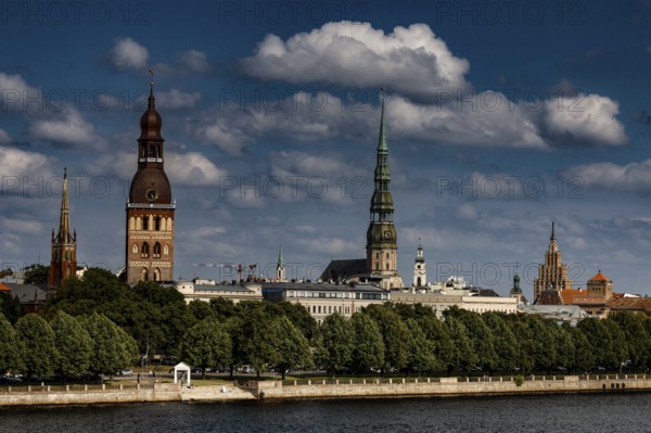 View of Riga's skyline with cathedral, St. Peter's Church and the Duna, Riga, Latvia