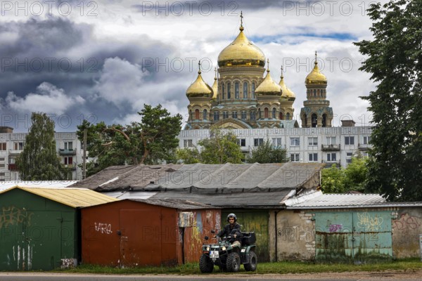 Prefabricated buildings and golden domes of St. Nicholas Cathedral in Karosta, Liepaja, Liepaja, Latvia