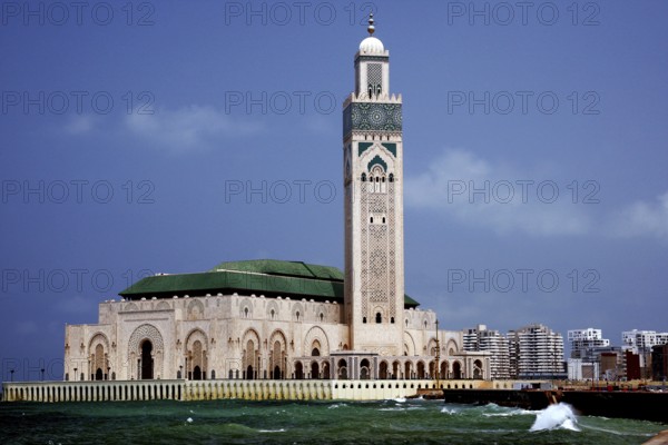 Impressive mosque right by the sea under blue sky, Casablanca, Grand Casablanca, Morocco