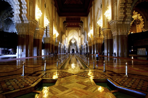 Beautifully illuminated interior of a mosque with ornate decorations, Casablanca, Grand Casablanca, Morocco
