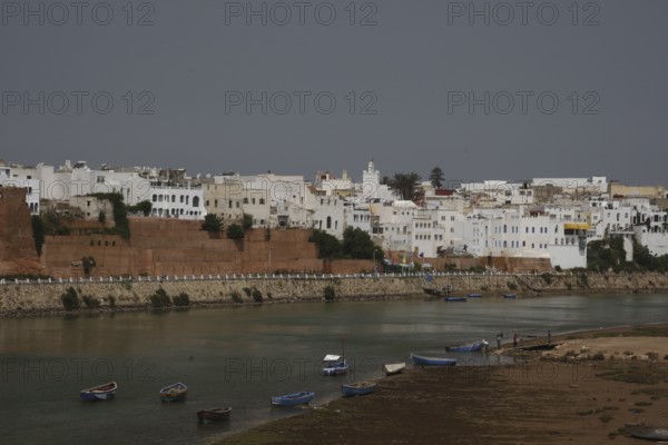 Riverside with historic buildings in Azemmour, quiet atmosphere under cloudy sky, Azemmour, zero, Morocco