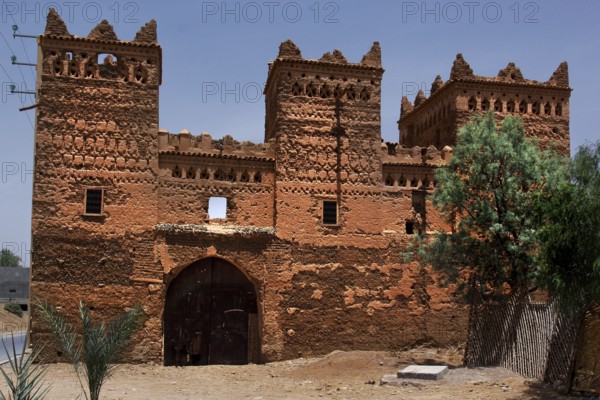 Historic clay kasbah in Agdz, characterized by traditional architectural elements, Agdz, Morocco
