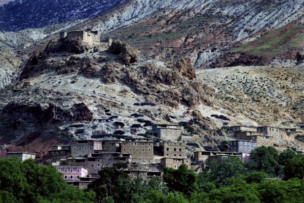 Village in rocky surroundings of the High Atlas with traditional houses and impressive landscape, zero