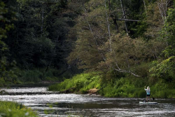 Fishermen near Kuku Klintis on the Gauja River, Gauja National Park, Latvia