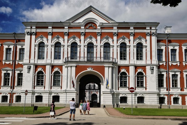 Historic castle with impressive architecture under blue sky, Jelgava, Latvia
