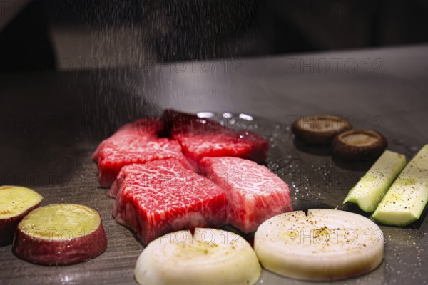 Preparation of Kobe beef and vegetables in Teppanyaki style, Kobe, Japan