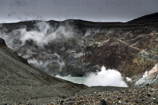 Steaming crater with geological layers and barren environment, Aso, Kumamoto, Japan