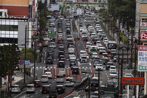 Traffic jam on Beppu's roads in front of a department store, Beppu, Oita, Japan