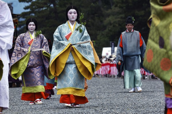 Procession participants in intricately designed costumes during Aoi Matsuri in Kyoto, Kyoto, Japan