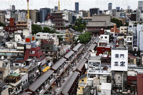 View of bustling Nakamise-dori Street with a view of Senso-ji Temple, Tokyo, Asakusa, Japan
