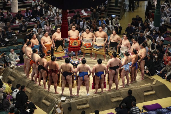 Sumo wrestlers in a ceremonial circle at Makuuchi in Sumo Stadium, Tokyo, Ryogoku, Japan