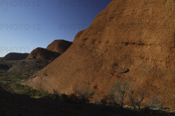 Massive red rocks in the Valley of the Winds near Kata Tjuta against a clear sky, Kata Tjuta, Northern Territory, Australia