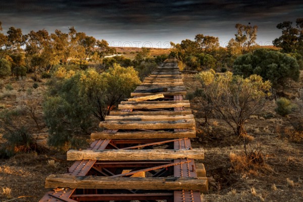 Abandoned railway bridge of Old Ghan in the midst of nature, South Australia, Australia