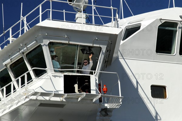 Close-up of the bridge of a Hurtigruten ship under a blue sky, N Kirkenes, zero