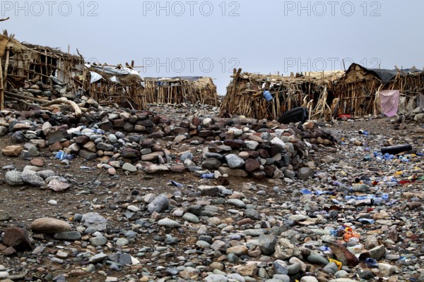 Rocky cottage settlement with barren atmosphere, Ahmedela, Ethiopia