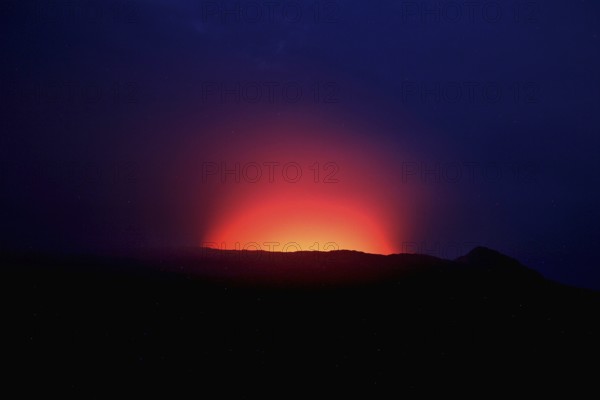 Bright red-orange crater rim of Erta Ale at night, Erta Ale, zero, Ethiopia