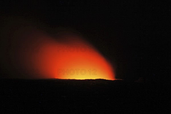 Fiery glow over the crater of a volcano at night, Erta Ale, Ethiopia