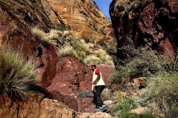 Mountain guides climbing through rocky terrain in the Gheralta Mountains, zero