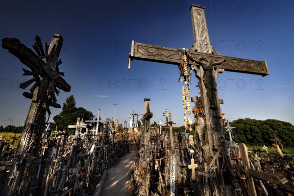 Large wooden cross on a hill with numerous smaller crosses, Siauliai, Lithuania