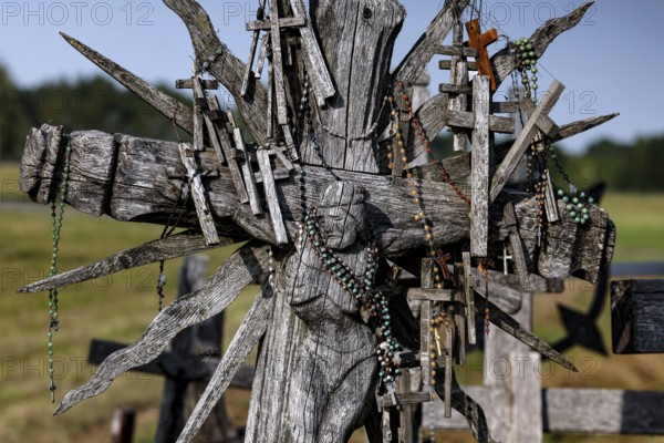 Elaborate wooden crosses on the Hill of Crosses in Siauliai, Siauliai, Lithuania