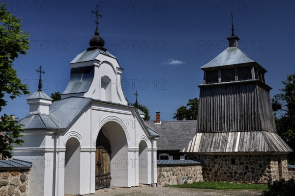 Church with wooden bell tower and gate in the open-air museum, Rumsiskes, Kauno apskritis, Lithuania