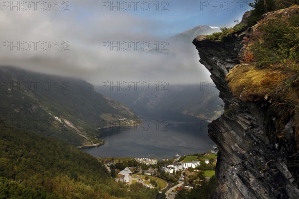 Majestic view of Geirangerfjord from Flydalsjuvet under cloudy sky, Flydalsjuvet, Geirangerfjord, Møre og Romsdal, Norway