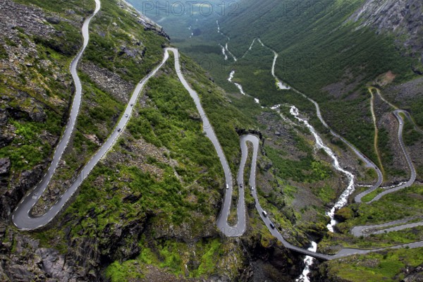 Trollstigen Serpentine Road snakes dramatically through rugged mountain scenery in Geiragervegen