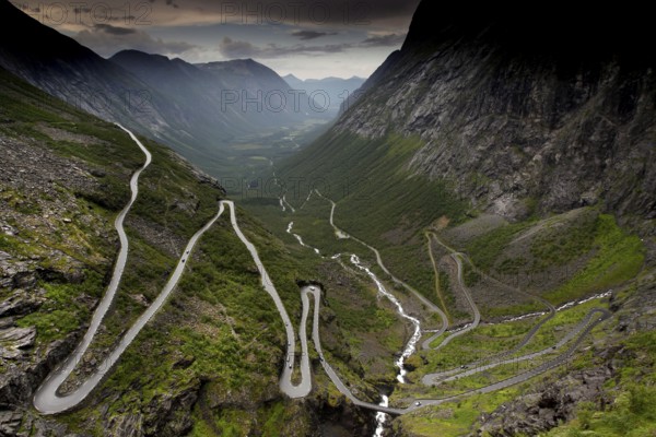 Dramatic serpentine road Trollstigen, snaking through picturesque mountain scenery, Trollstigen, Møre og Romsdal, Norway