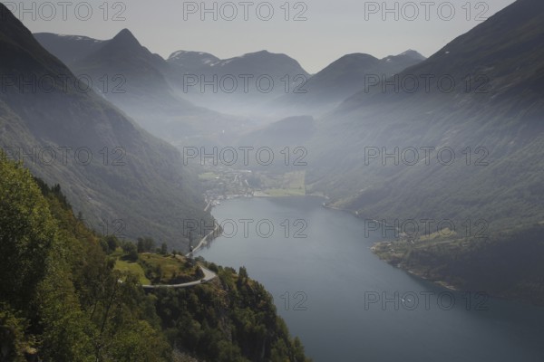 View of Geiranger and Geiranger Fjord from the Ørnevegen Serpentine Road, Geiranger, Møre og Romsdal, Norway