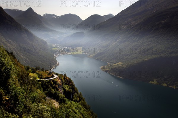 View of Geiranger and a picturesque fjord landscape from the Ørnevegen Serpentine Road, Geiranger, Møre og Romsdal, Norway