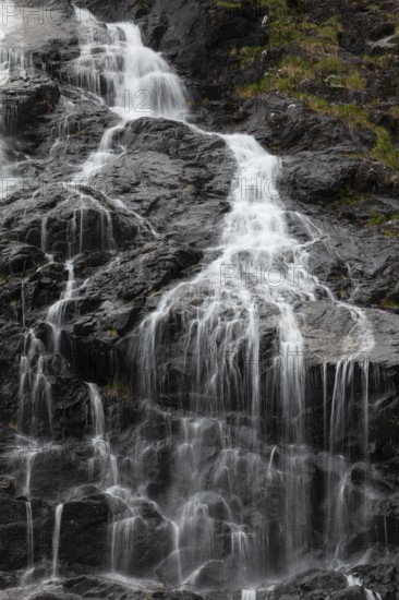 Summer day visiting Espelandsfossen falls near Bergen, scenic nature and flowing water, Vestland, Norway