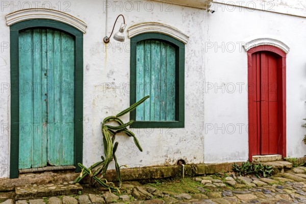 Old house facade with colorful doors and windows in the historic city of Paraty, Paraty, Rio de Janeiro, Brazil