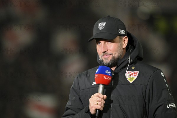 Coach coach Sebastian Hoeness VfB Stuttgart interviewed microphone microphone logo SKY MHPArena, MHP Arena Stuttgart, Baden-Württemberg, Germany