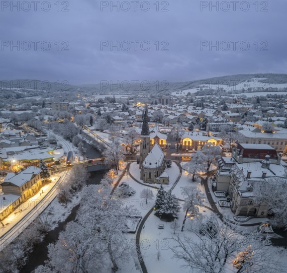 Aerial photos twilight winter theatre park with St. Mary's Church, Berndorf, Lower Austria, Austria