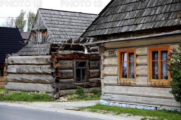 Traditional wooden houses in the village of Chocholow, Podhale-style wooden architecture, listed by UNESCO, near Zakopane, Lesser Poland Voivodeship, Poland