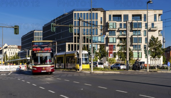 Berlin road traffic with buses, trams and pedestrians at and around the main train station, Berlin, Germany