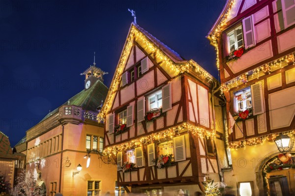 Colourfully illuminated and Christmassy decorated half-timbered houses, old town, blue hour, Colmar, Haut-Rhin department, Alsace, France