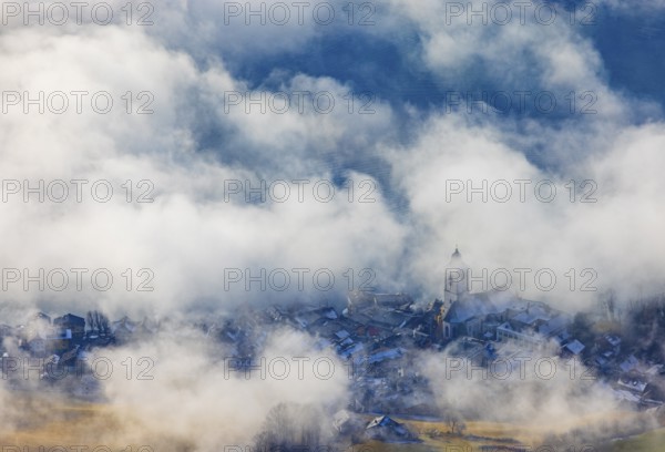 View of a sea of fog from Vormauerstein, Sankt Wolfgang am Wolfgangsee, church tower rising out of the fog, inversion weather, Osterhorn Group, Salzkammergut, Province of Salzburg, Austria