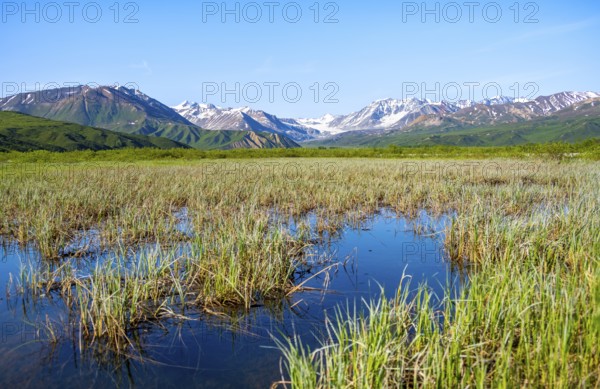 Lake and picturesque mountain landscape with Gulkana glacier and summit Icefall Peak, Richardson Highway, Alaska Range, Alaska, USA