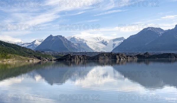 Mountain landscape reflected in glacial lake, Mount Blackburn and Kennicott Glacier, McCarthy Road, Wrangell St. Elias National Park, Alaska, USA