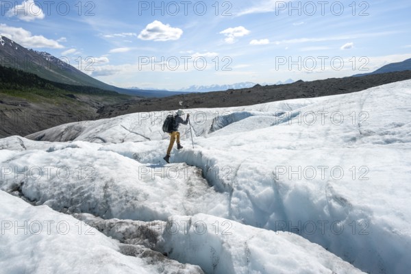 Climbers on the ice of Root Glacier, Wrangell St. Elias National Park, Alaska, USA