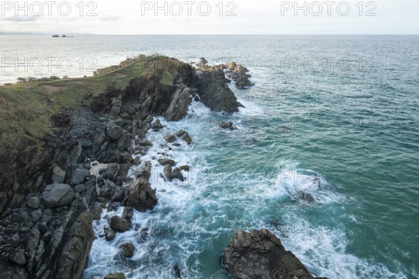 Sunset with wide view over the east coast at Cape Byron, New South Wales, Australia