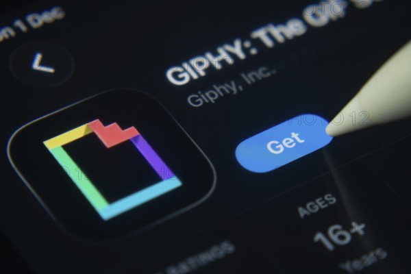 Dhaka, Bangladesh- 01 Dec 2025: A close-up of the GIPHY app icon in the App Store on an iPad screen